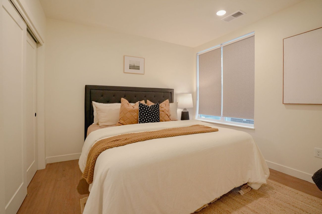 Bedroom with an upholstered headboard