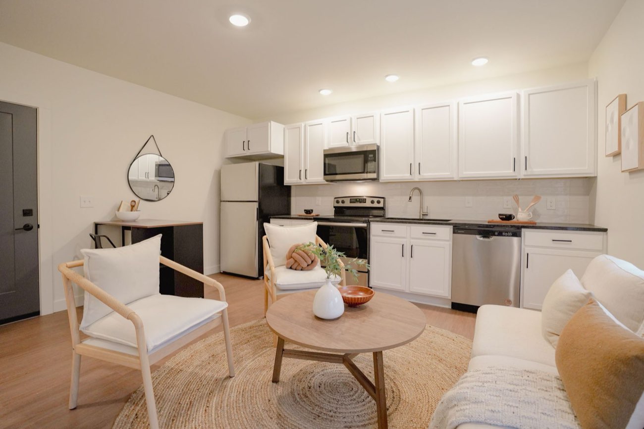 Kitchen with white cabinets and stainless steel appliances