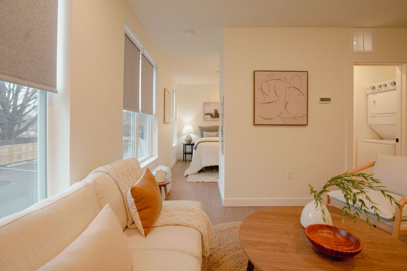 Living area with in-unit washer and dryer